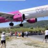 Plane Nearly Bonks Tourists On The Ground Making The Lowest Landing Ever At The Skiathos Airport, Greece!