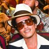 Bruno Mars Jokes Rumored Debt To Celebrate Streaming Record