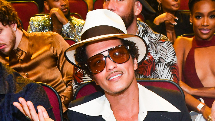 Bruno Mars Jokes Rumored Debt To Celebrate Streaming Record