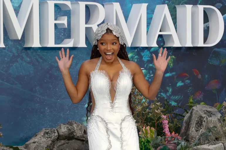 Halle Bailey Gets Wet In Skimpy Bikini & Lets Nature Handle The Rest